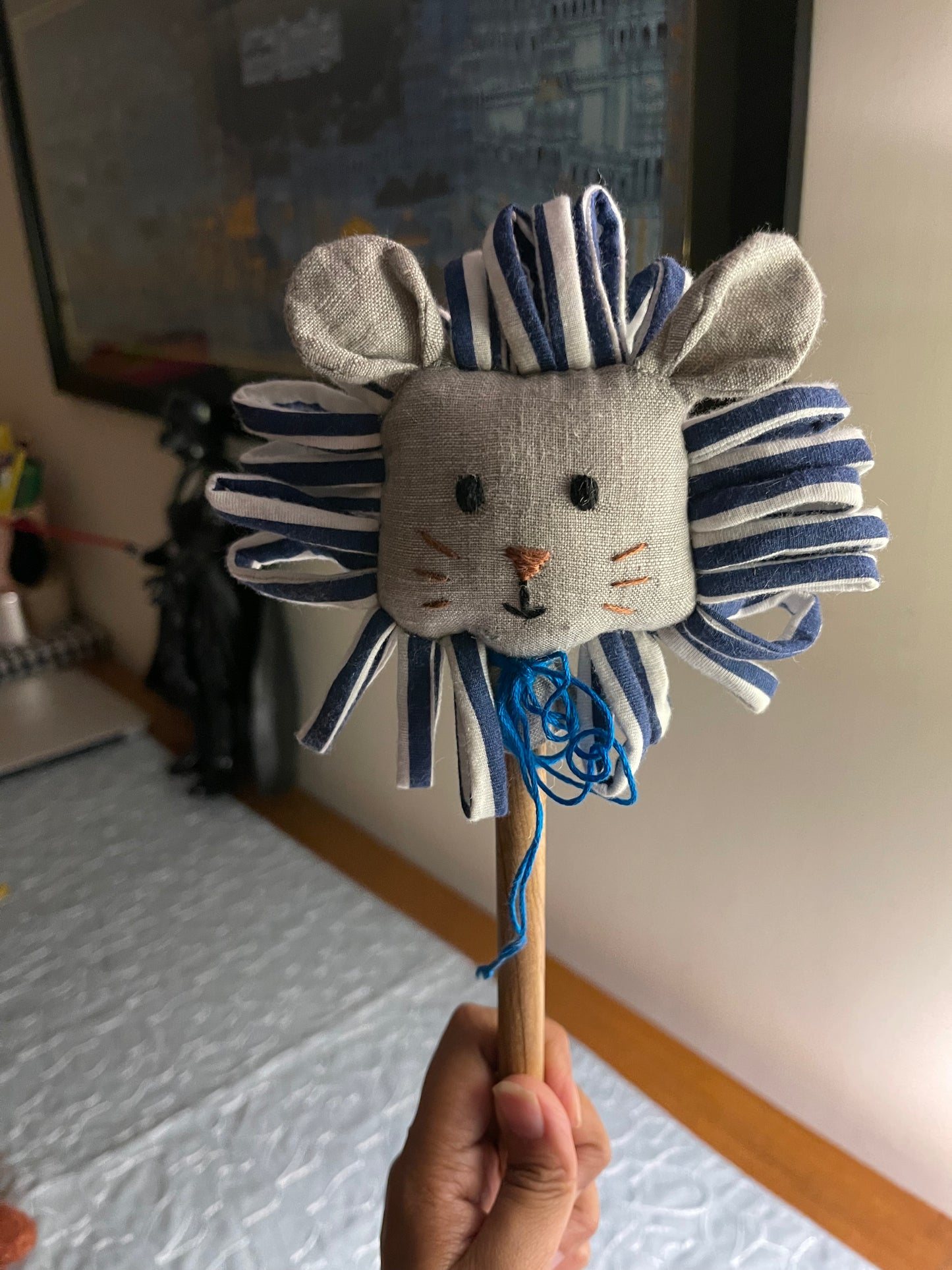 BLUE LION ON STICK