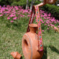 Kutch Painted Pottery Donut Bottle with Strap